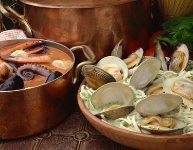 Seafood stew with linguine and clams