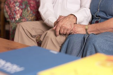 Man and woman holding hands