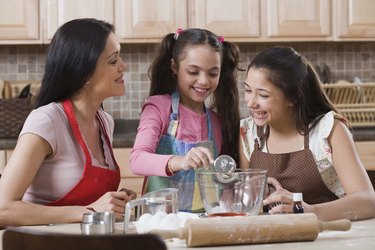 Family baking in kitchen