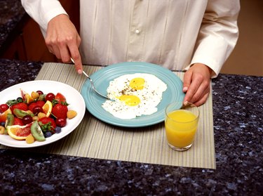 Person eating breakfast