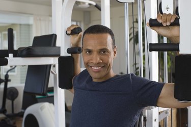 Man working out in home gym