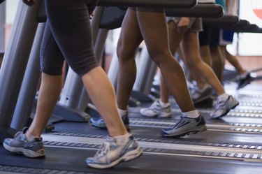 People on treadmills in gym