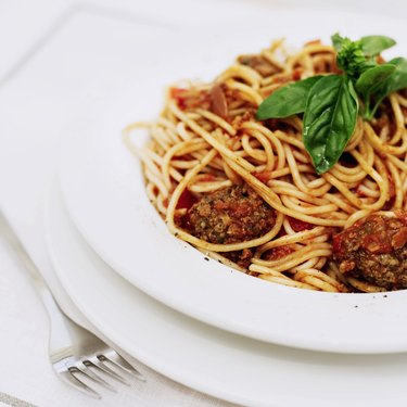 spaghetti and meatballs in a bowl