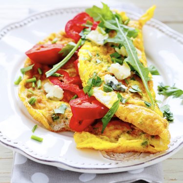 breakfast with fried eggs and vegetables