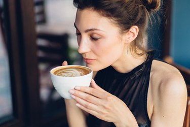 Pretty woman drinking coffee