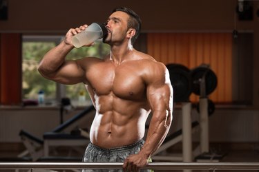 Bodybuilder Drinking Water From Shaker