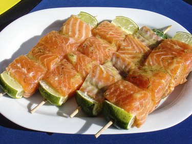 salmon skewer with lemon ready for BBQ