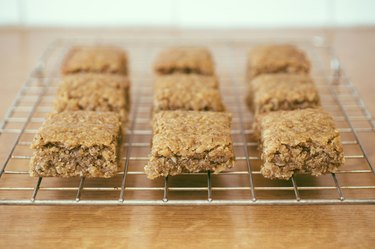 Traditional homemade pieces of Flapjack on a cooling rack.