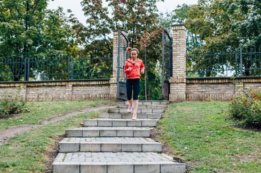 Woman running down the stairs