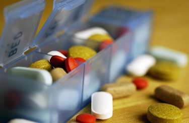 Pill organizer with pills