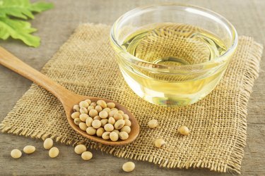 Soybeans and soybean oil on counter