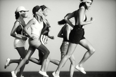 Women jogging, side view