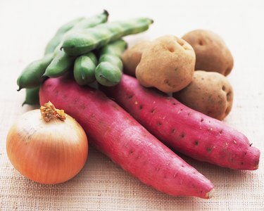 Closed Up Image of Some Red Japanese Potatoes, an Onion, Potatoes and Broad Beans, High Angle View, Differential Focus