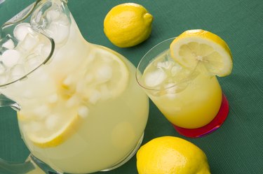 Pitcher and glass of lemonade