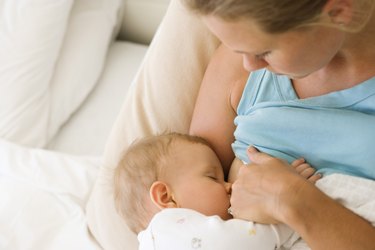 Mother breastfeeding child