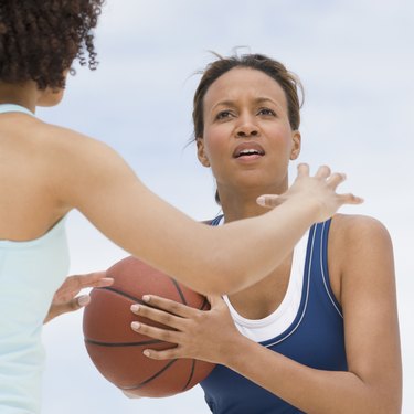 African women playing basketball