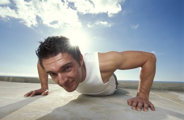 Man doing push-up outdoors