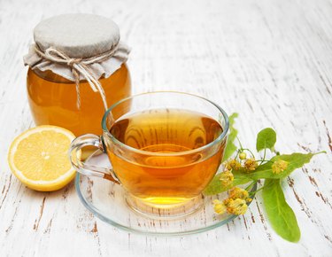 cup of herbal tea with linden flowers