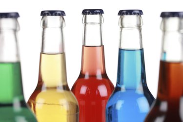 Glass bottles with soft drinks