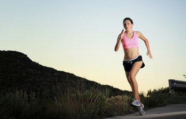 Woman running on mountain