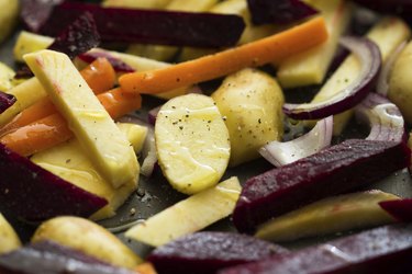 Prepared roots for baking dish, carrots, potatoes, beets, radish
