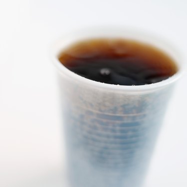 Close-up of a plastic cup of cola