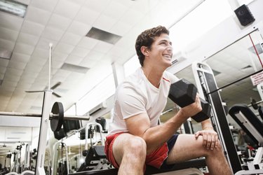 Man lifting dumbbells