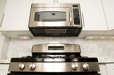 Steel oven with microwave in kitchen