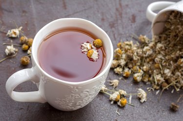 Herbal tea with chamomile flowers