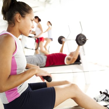 young woman working out at the gymnasium