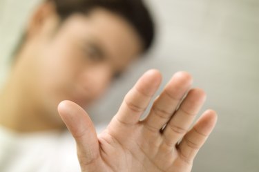 Man holding hand out, close-up