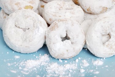 small icing sugar covered donuts