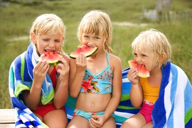 Girls eating watermelon