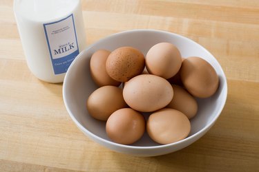 Milk with bowl of eggs