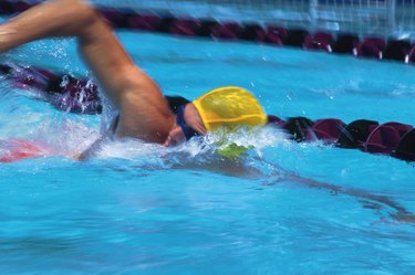 Competitive swimmer in pool