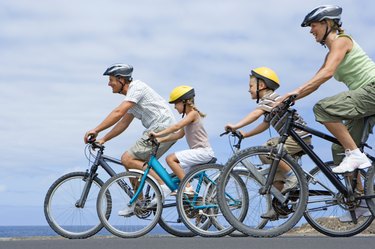 Family riding bikes together