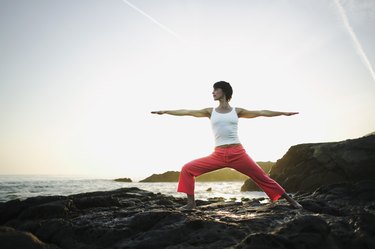Woman in yoga warrior pose
