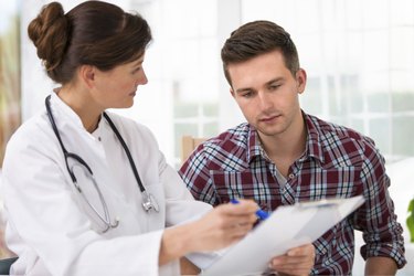 doctor with male patient