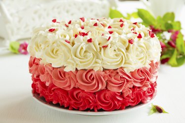 Homemade cake "Red Velvet" decorated with cream.