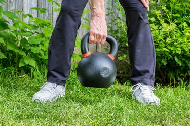 kettlebell workout in backyard