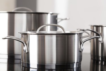 Aluminum pots on the kitchen top