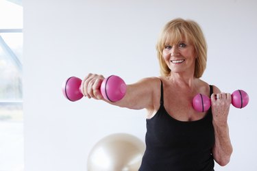 Senior Woman Training with Weights