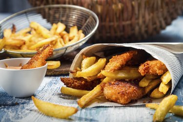 Closeup of Fish & Chips served in paper