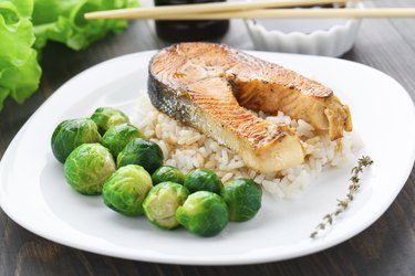 Fried salmon with rice and brussels sprouts