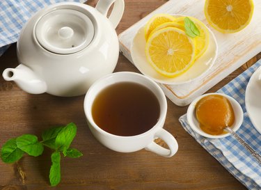 Teapot and cup with tea