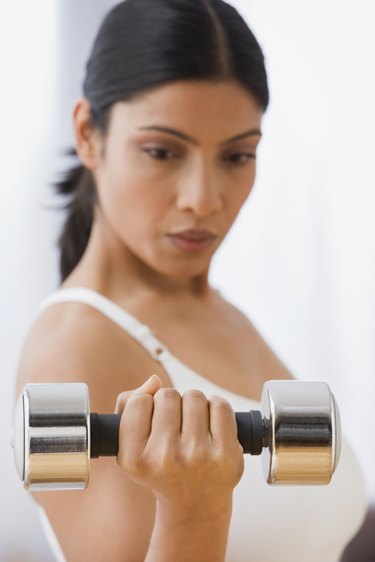 Indian woman lifting weights