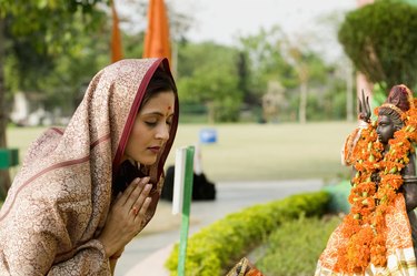 Young woman offering prayers