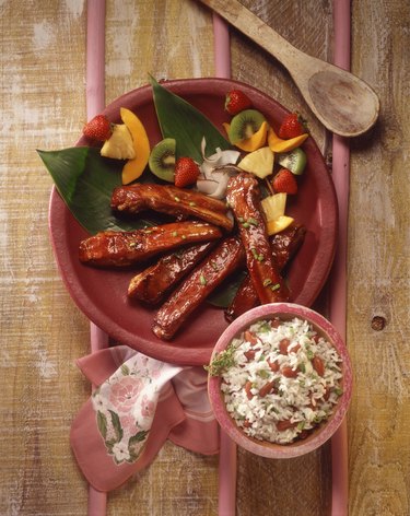 BBQ ribs with fruit kabobs and rice