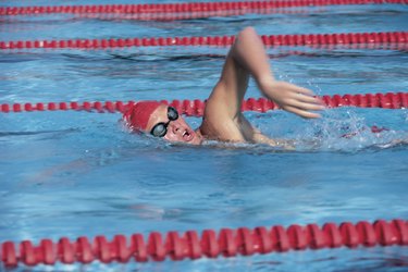 Person swimming in pool