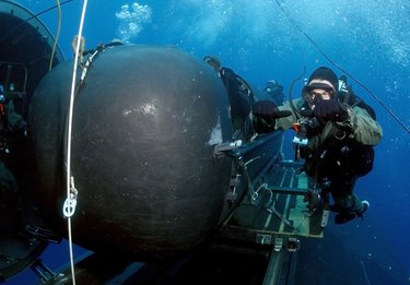 Atlantic Ocean, May 5, 2005 - A member of the SEAL Delivery Vehicle Team prepares to launch one of the team's SEAL Delivery Vehicles (SDV) from the back of the Los Angeles-class attack submarine USS Philadelphia (SSN-690) on a training exercise. 